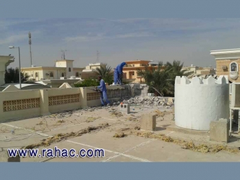 تكسير وإزالة طوفة السطح القديم 